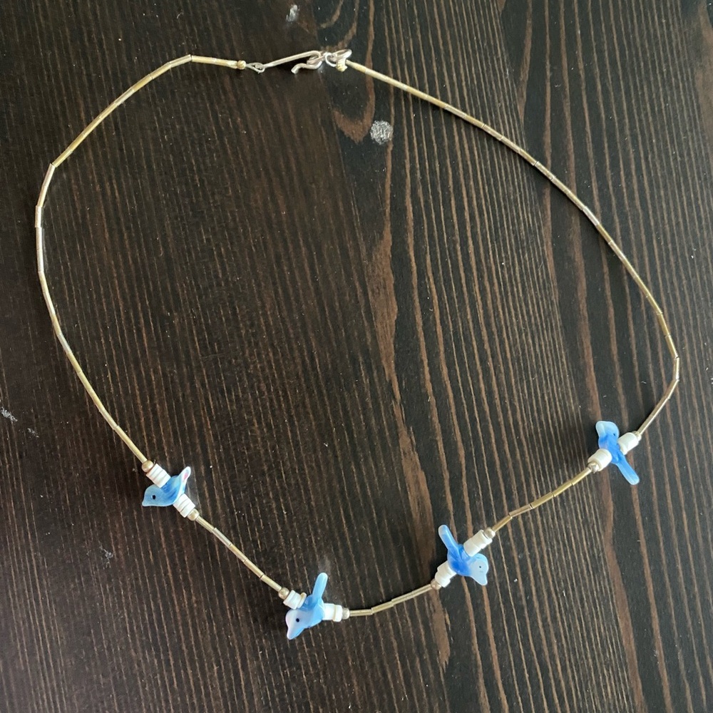 Liquid silver chocker with carved bluebirds